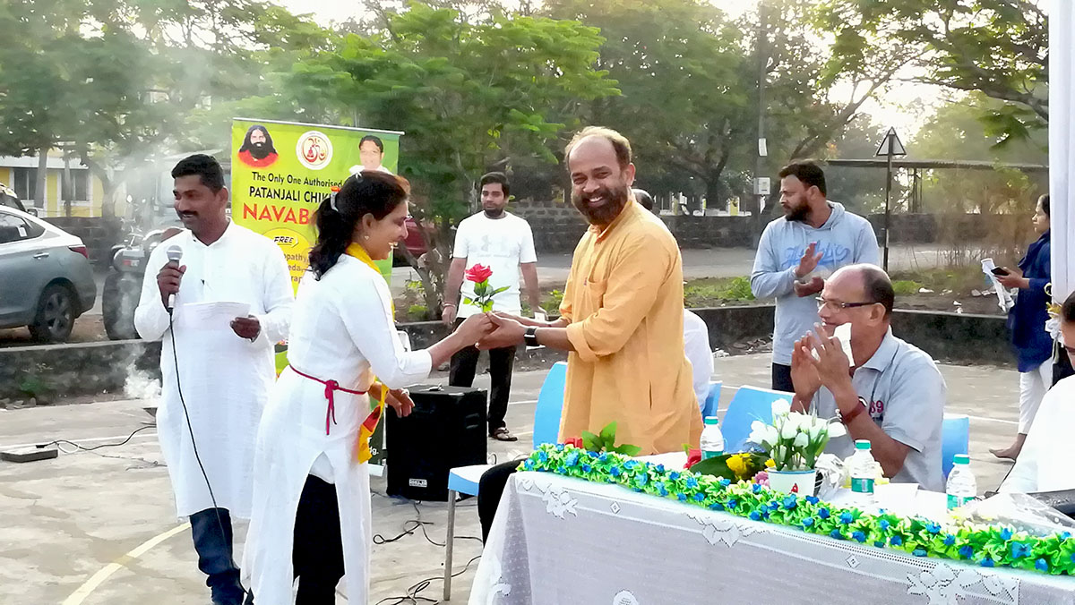 Yoga Guru Dr. Namdev Chopdecar being felicitated.