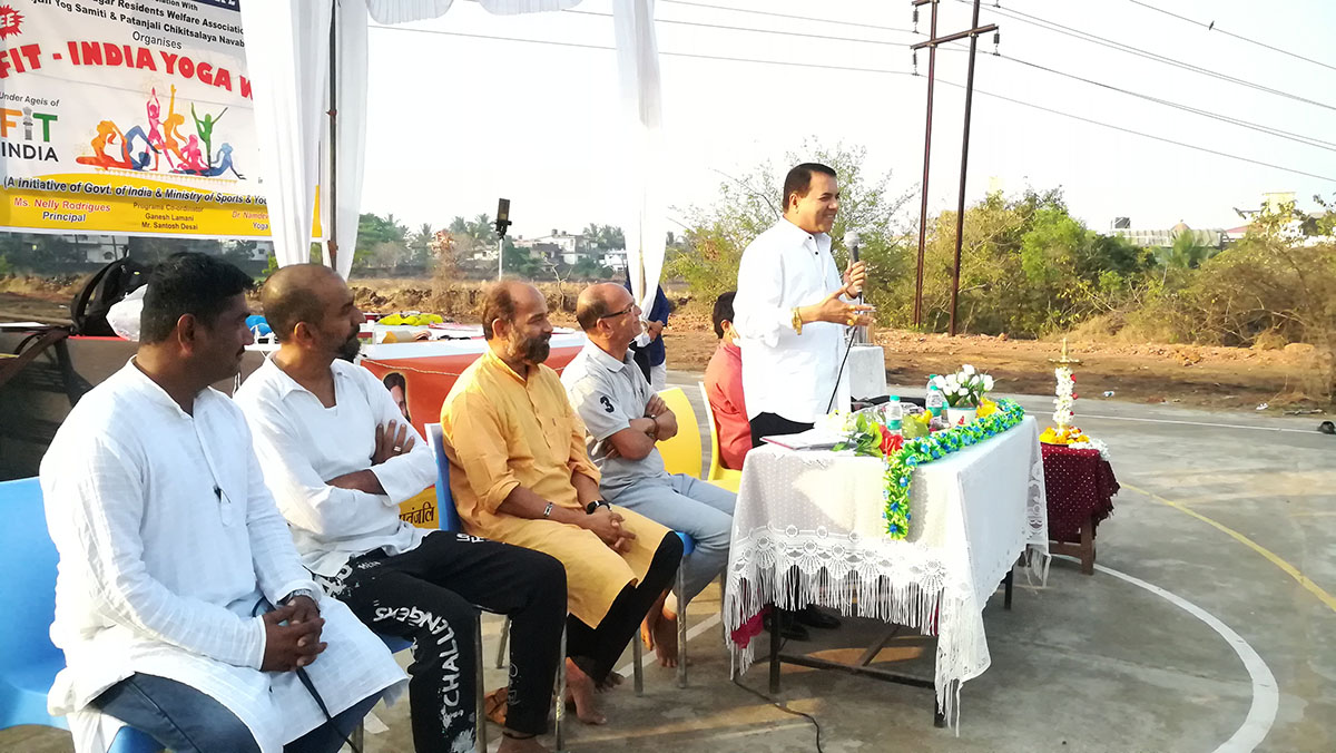 Sancoale Sarpanch and Chief Guest for the final day of Yoga Session, Shri Ramakant Borkar giving a speech.